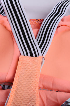 Tankini con espalda cruzada y empalme estampado naranja